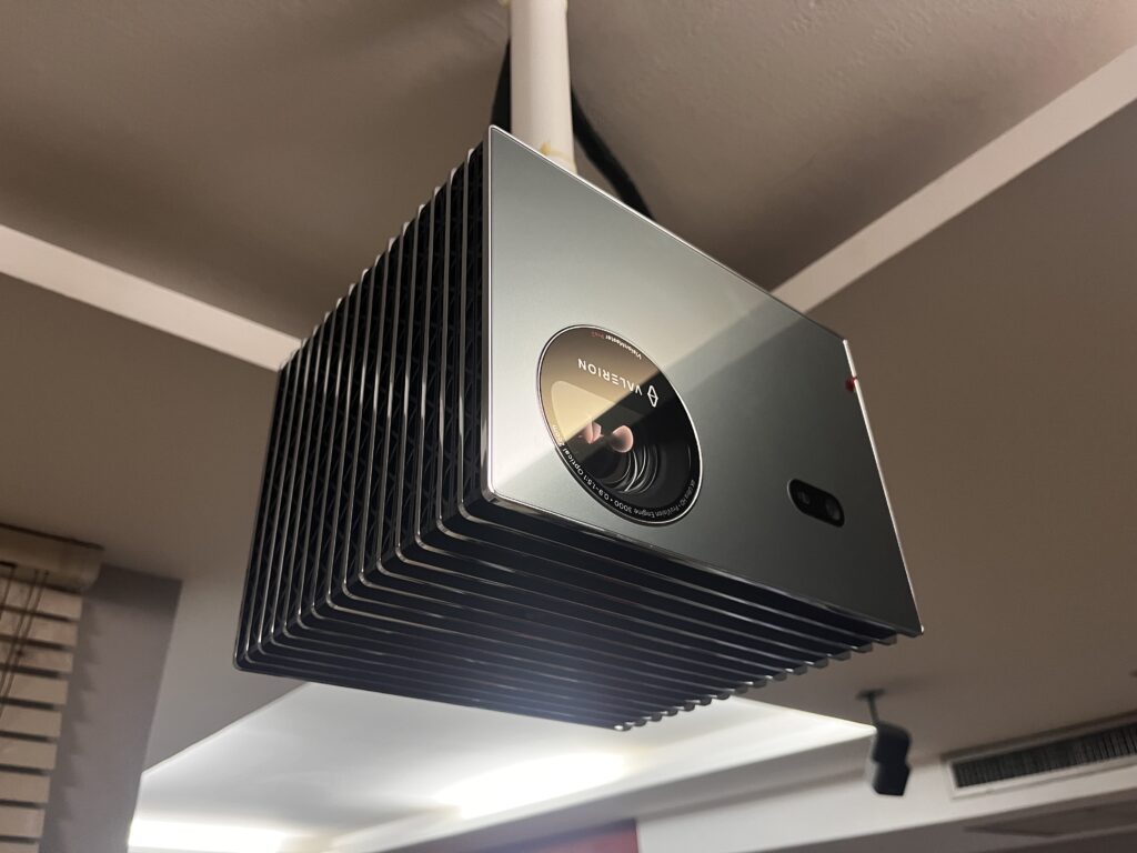 Valerion VisionMaster Pro 2 installed with Genius Screen Optical 8K 100-inch projection screen by HDT Homedigital.
